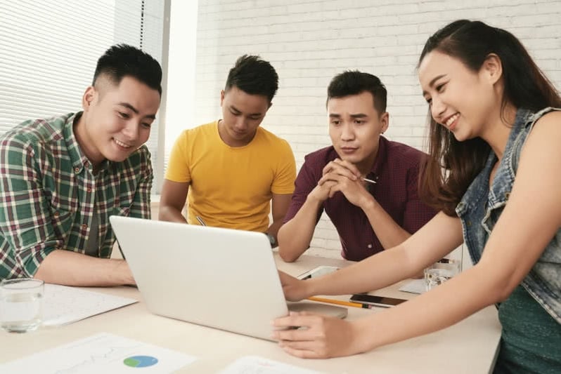 A group of Korean students working together 